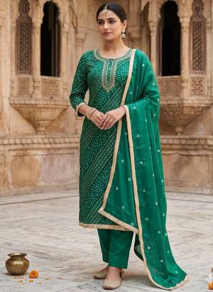 Looking These Suit in Fine Colored Pair With Bottom And Dupatta.These Top Are Cotton And Dupatta Are Fabricated On Nazmin Pair With Cotton Bottom.Its Beautified With Designer Printed, Hand Work.