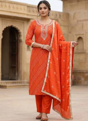 Looking These Suit in Fine Colored Pair With Bottom And Dupatta.These Top Are Cotton And Dupatta Are Fabricated On Nazmin Pair With Cotton Bottom.Its Beautified With Designer Printed, Hand Work.