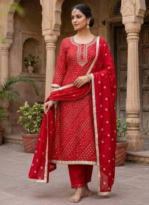 Looking These Suit in Fine Colored Pair With Bottom And Dupatta.These Top Are Cotton And Dupatta Are Fabricated On Nazmin Pair With Cotton Bottom.Its Beautified With Designer Printed, Hand Work.