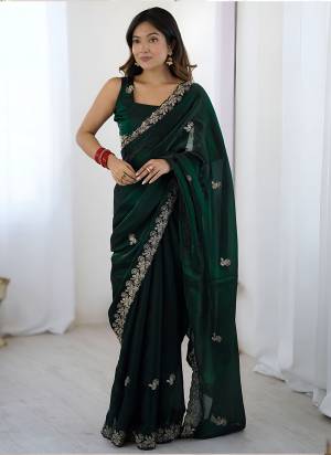Attractive Look These Party Wear Saree in Fine Colored.These Saree Are Fendy Satin Silk And Blouse is Fendy Satin Silk Fabricated.Its Beautified With Designer Sequance,Thread,Codding Embroidery Cut Work.