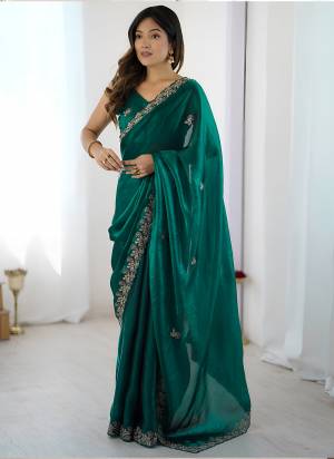 Attractive Look These Party Wear Saree in Fine Colored.These Saree Are Fendy Satin Silk And Blouse is Fendy Satin Silk Fabricated.Its Beautified With Designer Sequance,Thread,Codding Embroidery Cut Work.