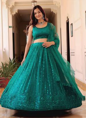 For A Designer Look,Grab These Lehenga Choli in Fine Colored.These Lehenga And Blouse Are Fabricated On Georgette Pair With Dupatta Are Georgette.Its Beautified With Thread,Sequance Embroidery Work.
