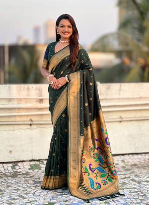 Garb These Party Wear Saree in Fine Colored.These Saree And Blouse is Fabricated On Paithani Silk.Its Beautified With Weaving Gold Jari, Peacock Paithani Meenakari Pallu Designer.
