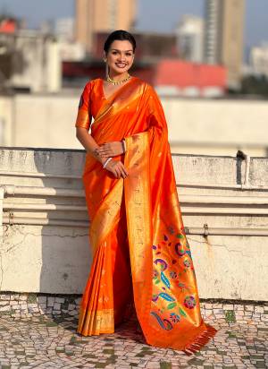 Garb These Party Wear Saree in Fine Colored.These Saree And Blouse is Fabricated On Paithani Silk.Its Beautified With Weaving Gold Jari, Peacock Paithani Meenakari Pallu Designer.