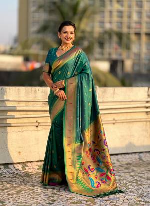 Garb These Party Wear Saree in Fine Colored.These Saree And Blouse is Fabricated On Paithani Silk.Its Beautified With Weaving Gold Jari, Peacock Paithani Meenakari Pallu Designer.