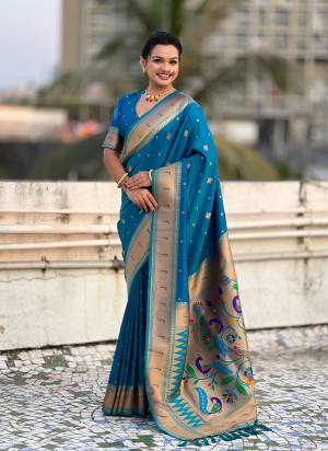 Garb These Party Wear Saree in Fine Colored.These Saree And Blouse is Fabricated On Paithani Silk.Its Beautified With Weaving Gold Jari, Peacock Paithani Meenakari Pallu Designer.