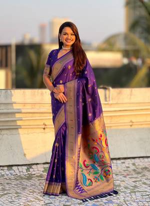 Garb These Party Wear Saree in Fine Colored.These Saree And Blouse is Fabricated On Paithani Silk.Its Beautified With Weaving Gold Jari, Peacock Paithani Meenakari Pallu Designer.