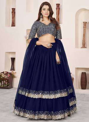 For A Designer Look,Grab These Party Wear Lehenga Choli in Fine Colored.These Lehenga And Blouse Are Fabricated On Georgette Pair With Dupatta Are Soft Net.Its Beautified With Designer Jari,Sequance Embroidery Work.