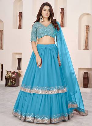 For A Designer Look,Grab These Party Wear Lehenga Choli in Fine Colored.These Lehenga And Blouse Are Fabricated On Georgette Pair With Dupatta Are Soft Net.Its Beautified With Designer Jari,Sequance Embroidery Work.