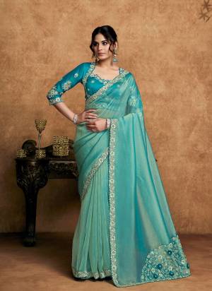 Look Attrective These Designer Party Wear Saree in Fine Colored.These Saree Are Zari Organza Satin Silk And Blouse Raw Satin Silk is Fabricated.Its Beautified Desiger Embroidery,Pearl,Stone Work.