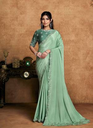 Look Attrective These Designer Party Wear Saree in Fine Colored.These Saree Are Crepe Satin Silk And Blouse Satin Silk is Fabricated.Its Beautified Desiger Embroidery,Pearl,Stone Work.