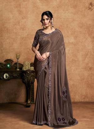 Look Attrective These Designer Party Wear Saree in Fine Colored.These Saree Are Lustrous Satin Silk And Blouse Raw Slub Silk is Fabricated.Its Beautified Desiger Embroidery,Pearl,Stone Work.