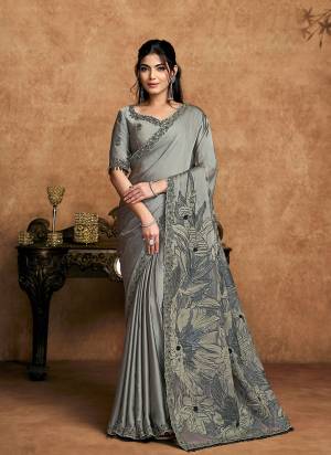 Look Attrective These Designer Party Wear Saree in Fine Colored.These Saree Are Satin Silk And Blouse Satin Silk is Fabricated.Its Beautified Desiger Embroidery,Pearl,Stone Work.