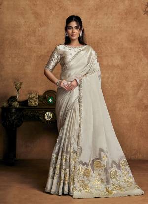 Look Attrective These Designer Party Wear Saree in Fine Colored.These Saree Are Uppada Silk And Blouse Milky Satin Silk is Fabricated.Its Beautified Desiger Embroidery,Pearl,Stone Work.