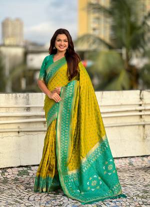Looking These Party Wear Saree in Fine Colored.These Saree And Blouse is Fabricated On Patola Silk.Its Beautified With Weaving Meenakari Ikkat Designer.