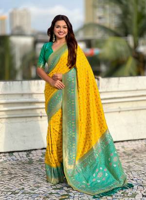 Looking These Party Wear Saree in Fine Colored.These Saree And Blouse is Fabricated On Patola Silk.Its Beautified With Weaving Meenakari Ikkat Designer.