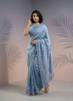 Garb These Party Wear Saree in Fine Colored.These Saree And Blouse is Fabricated On Rasberry Silk.Its Beautified With Heavy Designer Embroidery Laheriya Work.