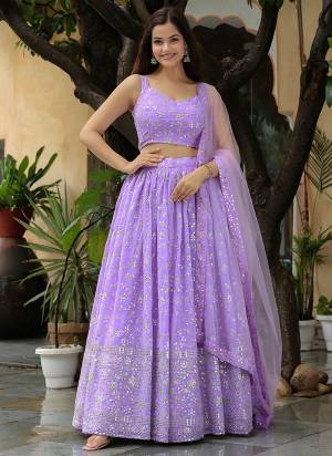 For A Designer Look,Grab These Lehenga Choli in Fine Colored.These Lehenga And Blouse Are Fabricated On Georgette Pair With Dupatta Are Soft Net.Its Beautified With Jari,Sequance Embroidery Work.