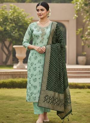 Looking These Suit in Fine Colored Pair With Bottom And Dupatta.These Top Are Cotton Silk And Dupatta Are Fabricated On Banarasi Jacquard Pair With Dull Santoon Bottom.Its Beautified With Designer Printed, Hand Work.