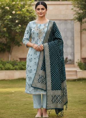 Looking These Suit in Fine Colored Pair With Bottom And Dupatta.These Top Are Cotton Silk And Dupatta Are Fabricated On Banarasi Jacquard Pair With Dull Santoon Bottom.Its Beautified With Designer Printed, Hand Work.
