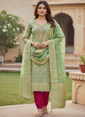 Looking These Suit in Fine Colored Pair With Bottom And Dupatta.These Top Are Banarasi Cotton And Dupatta Are Fabricated On Banarasi Cotton Pair With Rayon Bottom.Its Beautified With Woven Jacquard  Designer, Hand Work.