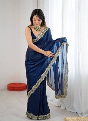 Attractive These Fancy Party Wear Saree in Fine Two Tone Colored.These Saree Are Fendy Satin Silk And Blouse is Fendy Satin Silk Fabricated.Its Beautified With Two Tone Color,Designer Sequance,Jari Embroidery Cut Work.