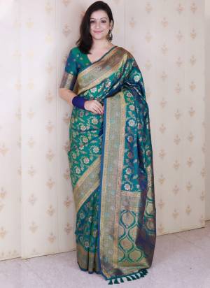 Garb These Party Wear Saree in Fine Colored.These Saree And Blouse is Fabricated On Banarasi Silk.Its Beautified With Weaving Jari,Meenakari Jaal Designer.
