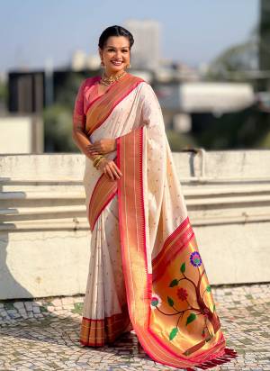 Looking These Party Wear Saree in Fine Colored.These Saree And Blouse is Fabricated On Paithani Silk.Its Beautified With Weaving Swan Meenakari Designer.