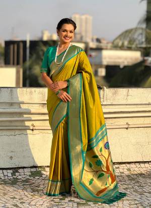 Looking These Party Wear Saree in Fine Colored.These Saree And Blouse is Fabricated On Paithani Silk.Its Beautified With Weaving Swan Meenakari Designer.
