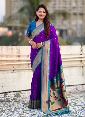 Looking These Party Wear Saree in Fine Colored.These Saree And Blouse is Fabricated On Paithani Silk.Its Beautified With Weaving Swan Meenakari Designer.