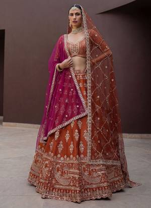 For A Fancy Designer Look,Grab These Lehenga Choli With 2 Dupatta in Fine Colored.These Lehenga And Choli Are Silk And Dupatta Are Fabricated On Net Pair.Its Beautified With Fancy Jari,Various Sequance Embroidery,Crystal Pipe Hand Work. 