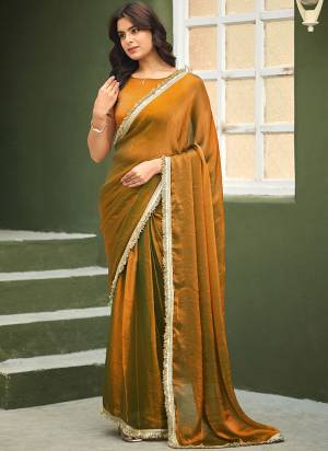 Looking These Party Wear Ready To Wear Saree in Fine Colored.These Saree Are Chiffon And Blouse is Chiffon Fabricated.Its Beautified With Solid Designer With Lace Border.