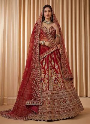 For A Fancy Designer Look,Grab These Lehenga Choli With 2 Dupatta in Fine Colored.These Lehenga And Choli Are Silk And Dupatta Are Fabricated On Net Pair.Its Beautified With Fancy Peacock Figure,Dori, Jari,Thread Embroidery,Diamond Work. 