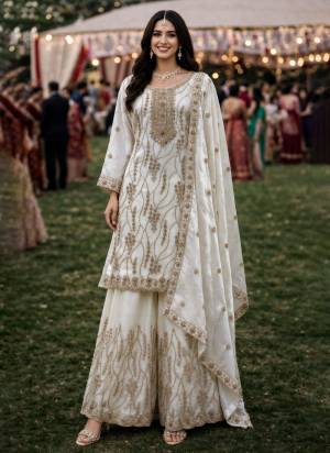 Attractive These Beautiful Looking Readymade Plazzo Suits.These Top And Dupatta Are Fendy Silk And Bottom Are Fendy Silk Fabricated.Its Beautified With Disigner Heavy Embroidery,Cut Beads Work.