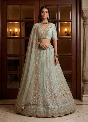 For A Fancy Designer Look,Grab These Lehenga Choli With Dupatta in Fine Colored.These Lehenga And Choli Are Net And Dupatta Are Fabricated On Net Pair.Its Beautified With Fancy Chapat Jari,Sequance,Multy Thread,Dori Embroidery,Zircon Diamond Work. 