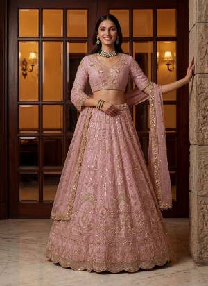 For A Fancy Designer Look,Grab These Lehenga Choli With Dupatta in Fine Colored.These Lehenga And Choli Are Net And Dupatta Are Fabricated On Net Pair.Its Beautified With Fancy Chapat Jari,Sequance,Multy Thread,Dori Embroidery,Zircon Diamond Work. 