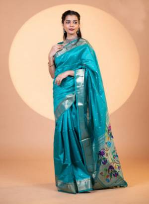 Looking These Festive Wear Saree in Fine Colored.These Saree And Blouse is Fabricated On Khadi Raw Silk.Its Beautified With Woven Meenakari Paithani Pallu Designer.