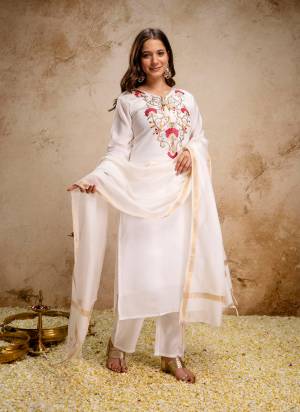 Garb These Suit in Fine Colored Pair With Bottom And Dupatta.These Top Are Roman Silk And Bottom Are Fabricated On Roman Silk Pair With Bhagalpuri Dupatta.Its Beautified With Designer Embroidery Work.