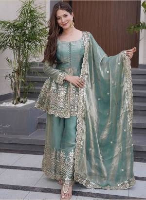 Garb These Suit in Fine Colored Pair With Bottom And Dupatta.These Top Are Fendy Silk And Bottom Are Fabricated On Fendy Silk Pair With Fendy Silk Dupatta.Its Beautified With Designer Embroidery Work.