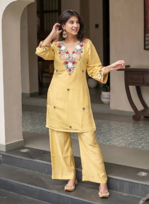 Garb These Suit in Fine Colored Pair With Bottom.These Top Are French Crepe And Bottom Are Fabricated On French Crepe Pair.Its Beautified With Designer Embroidery Work.