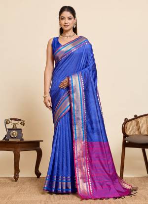 Garb This Party Wear Saree Paired With Blouse.This Saree And Blouse Are Silk Fabric With Heavy Woven Jari Designer. Buy This Pretty Saree Now.