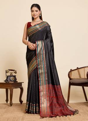 Garb This Party Wear Saree Paired With Blouse.This Saree And Blouse Are Silk Fabric With Heavy Woven Jari Designer. Buy This Pretty Saree Now.