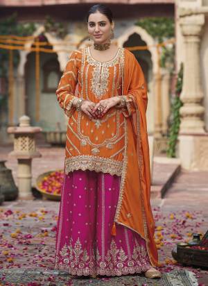 Orange colored palazzo style suit is prettified with Embroidery work and Sequence Work as shown which makes it appear classy. This top is made of Chinon fabric which is accompanied with Chinon Bottom,Chinon dupatta and Santoon Inner. Women can buy this suit to wear for their parties and functions.