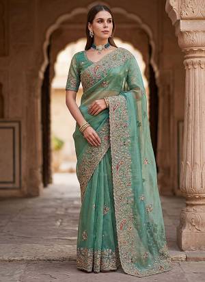 Attractive These Fastive And Wedding Party Wear Saree in Fine Colored.These Saree And Blouse is Fabricated On Gabana Silk.Its Beautified With Heavy Designer Peach,Dori,Multy Thread,Jari,Sequance Embroidery With Zircon Diamond Work.