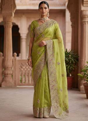 Attractive These Fastive And Wedding Party Wear Saree in Fine Colored.These Saree And Blouse is Fabricated On Gabana Silk.Its Beautified With Heavy Designer Peach,Dori,Multy Thread,Jari,Sequance Embroidery With Zircon Diamond Work.