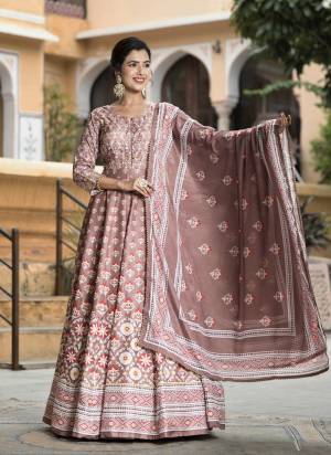 Attractive These Designer Readymade Gown With Dupatta in Fine Colored Pair.These Gown Are Fabricated On Dola Silk Pair With Chinon Dupatta.Its Beautified With Designer Digital Printed With Neck Hand Work.