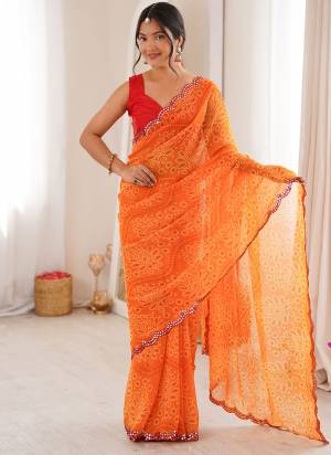 Attractive These Party Wear Saree in Fine Colored.These Saree Are Georgette And Blouse is Mono Banglori Fabricated.Its Beautified With Designer Bandhani Printed With Mirror Cut Work Border.