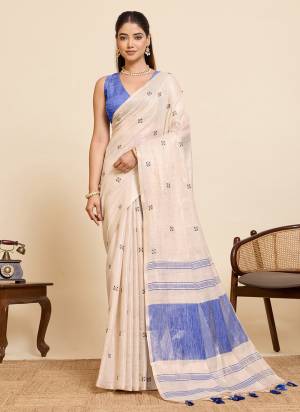 Garb This Party Wear Saree Paired With Blouse.This Saree And Blouse Are Linen Silk Fabric With Woven Pallu With Embroidery Work Designer. Buy This Pretty Saree Now.