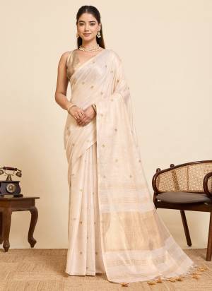 Garb This Party Wear Saree Paired With Blouse.This Saree And Blouse Are Linen Silk Fabric With Woven Pallu With Embroidery Work Designer. Buy This Pretty Saree Now.