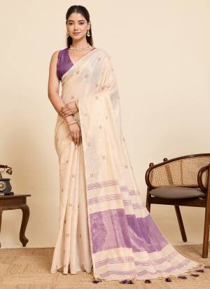 Garb This Party Wear Saree Paired With Blouse.This Saree And Blouse Are Linen Silk Fabric With Woven Pallu With Embroidery Work Designer. Buy This Pretty Saree Now.